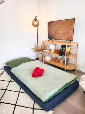 Ein Bett oder Betten in einem Zimmer der Unterkunft Stilvolle 3-Zimmer Wohnung in Ingolstadt mit Balkon und guter Autobahnanbindung
