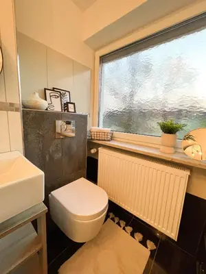 Ein Badezimmer in der Unterkunft Stilvolle 3-Zimmer Wohnung in Ingolstadt mit Balkon und guter Autobahnanbindung