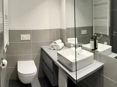 Ein Badezimmer in der Unterkunft Apartimo München-Unterhaching