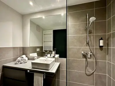 Ein Badezimmer in der Unterkunft Apartimo München-Unterhaching
