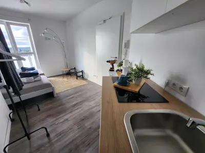 Grundriss der Unterkunft Cozy Apartment mit WIFI, Aufzug & Kostenlos Parken EL-Living