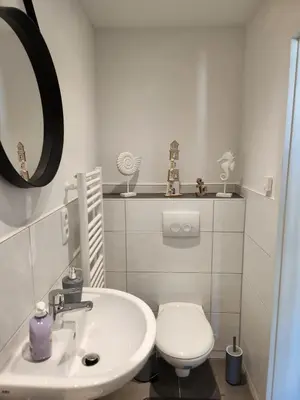 Ein Badezimmer in der Unterkunft Cozy Apartment mit WIFI, Aufzug & Kostenlos Parken EL-Living