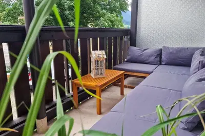Ein Sitzbereich in der Unterkunft Ferienwohnung Auszeit am See