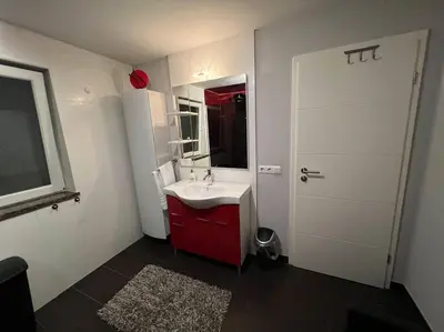 Ein Badezimmer in der Unterkunft Großzügige Ferienwohnung im Oberland