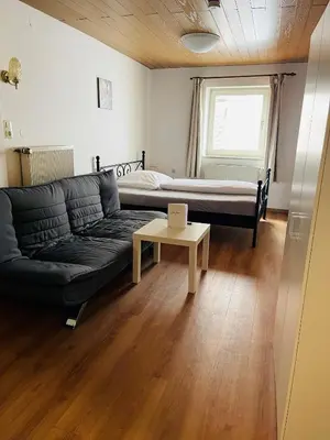 Ein Sitzbereich in der Unterkunft Hotel Jungbräu