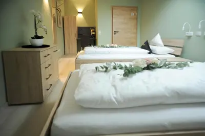 Ein Bett oder Betten in einem Zimmer der Unterkunft Boardinghouse Schongau