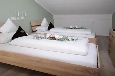 Ein Bett oder Betten in einem Zimmer der Unterkunft Boardinghouse Schongau