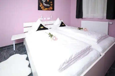 Ein Bett oder Betten in einem Zimmer der Unterkunft Boardinghouse Schongau