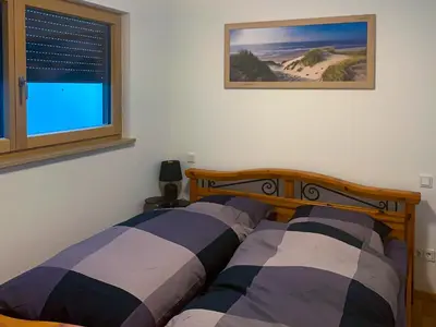 Ein Bett oder Betten in einem Zimmer der Unterkunft Wohnung möbliert, abgeschlossen und verkehrsgünstig gelegen