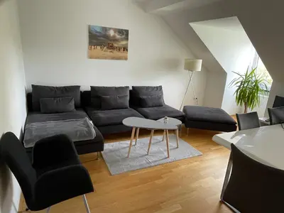 Ein Sitzbereich in der Unterkunft Penthouse - Englischer Garten view