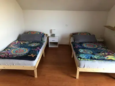 Ein Bett oder Betten in einem Zimmer der Unterkunft Schöne Ferienwohnung im Voralpenland