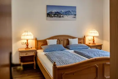 Ein Bett oder Betten in einem Zimmer der Unterkunft Ferienwohnungen LARA Wohnung 1