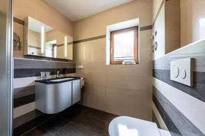 Ein Badezimmer in der Unterkunft Ferienwohnungen LARA Wohnung 1
