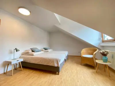 Ein Bett oder Betten in einem Zimmer der Unterkunft Traumurlaub WestCoast Ammersee 7 Gehminuten zum See