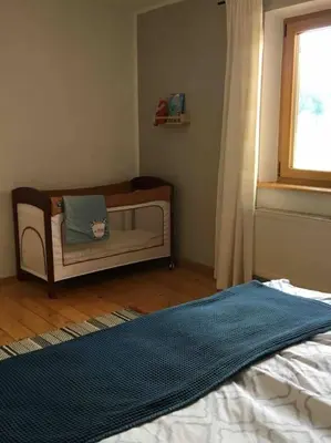 Ein Bett oder Betten in einem Zimmer der Unterkunft KampenZeit Ferienwohnung-traumhafter Panoramablick