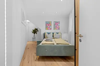Ein Bett oder Betten in einem Zimmer der Unterkunft Innenstadt- Parken- Nähe Rathaus