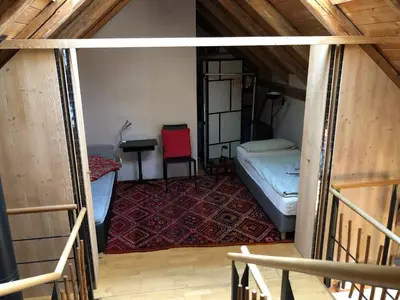 Ein Bett oder Betten in einem Zimmer der Unterkunft DOMIZIL VIA CLAUDIA