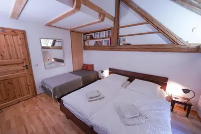 Ein Bett oder Betten in einem Zimmer der Unterkunft DOMIZIL VIA CLAUDIA