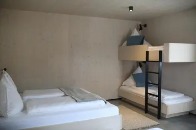 Ein Bett oder Betten in einem Zimmer der Unterkunft KampenZeit Loft mit traumhaftem Panoramablick