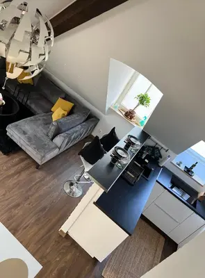Ein Sitzbereich in der Unterkunft Moderne Galerie-Wohnung! Zentral-A8-B17 WIFI