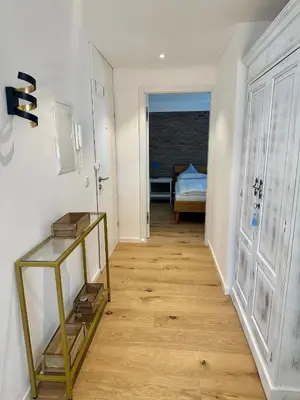 Ein Bett oder Betten in einem Zimmer der Unterkunft Apartment Sonnenschwan - Neurenoviert, zentrumsnah und ruhig