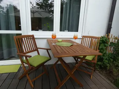 Ein Balkon oder eine Terrasse in der Unterkunft Ruhiges Garten-Studio CHIARA Gstadt Läufers Chiemsee Holiday Home