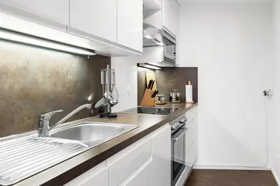 Küche/Küchenzeile in der Unterkunft PRIME - City Apartment für 6 - Neu & Modern