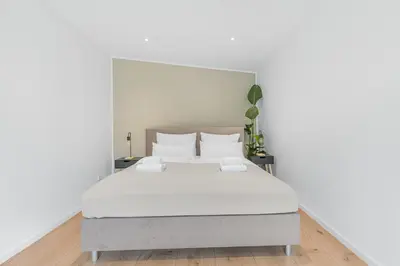 Ein Bett oder Betten in einem Zimmer der Unterkunft PRIME - City Apartment für 6 - Neu & Modern