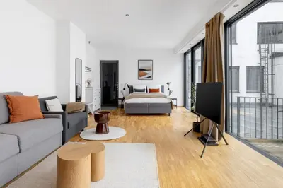 TV/Unterhaltungsangebot in der Unterkunft Global Living - Design Apartment I Rathausplatz I Kitchen I Augsburg