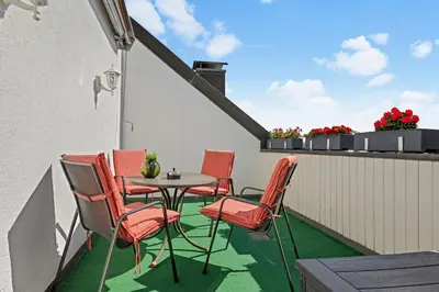 Ein Balkon oder eine Terrasse in der Unterkunft Stilvolle Wohnung: Private Dachterrasse - zentral