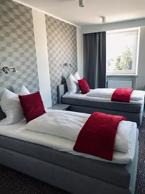 Ein Bett oder Betten in einem Zimmer der Unterkunft Ahorn-Zimmervermietung