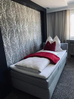 Ein Bett oder Betten in einem Zimmer der Unterkunft Ahorn-Zimmervermietung