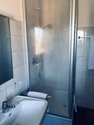 Ein Badezimmer in der Unterkunft Ahorn-Zimmervermietung