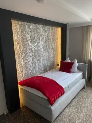 Ein Bett oder Betten in einem Zimmer der Unterkunft Ahorn-Zimmervermietung