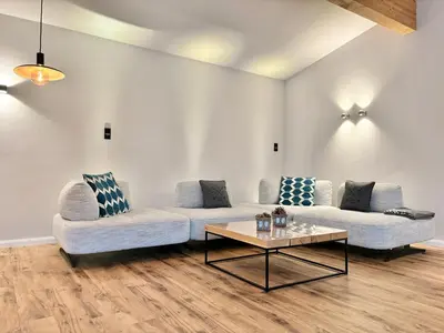 Ein Sitzbereich in der Unterkunft Snug Stays 4 - Design Villa mit Garten zentral, ruhig, 400m zum Ammersee