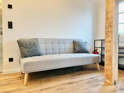 Ein Sitzbereich in der Unterkunft Snug Stays 4 - Design Villa mit Garten zentral, ruhig, 400m zum Ammersee