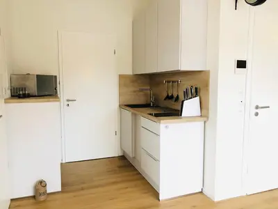 Küche/Küchenzeile in der Unterkunft Terralpin Apartments - Charmante DG Wohnung mit Balkon