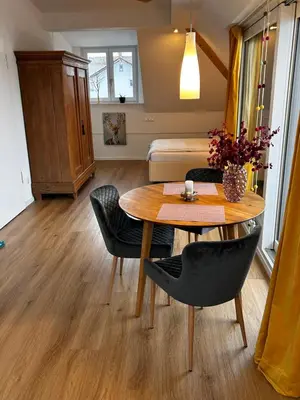 Ein Sitzbereich in der Unterkunft Terralpin Apartments - Charmante DG Wohnung mit Balkon