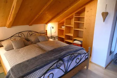 Ein Bett oder Betten in einem Zimmer der Unterkunft Ferienwohnung Goller