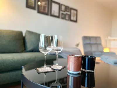 Ein Sitzbereich in der Unterkunft LTA Apartment Unterschleißheim bei München - 6P, Parkplatz, S-Bahn