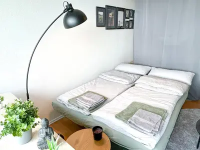 Ein Bett oder Betten in einem Zimmer der Unterkunft LTA Apartment Unterschleißheim bei München - 6P, Parkplatz, S-Bahn