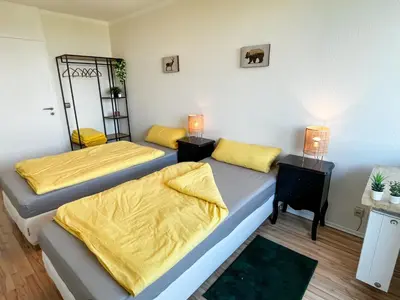 Ein Bett oder Betten in einem Zimmer der Unterkunft LTA Apartment Unterschleißheim bei München - 6P, Parkplatz, S-Bahn