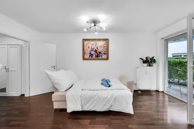 Ein Bett oder Betten in einem Zimmer der Unterkunft Wohnung im Herzen Münchens nähe Hauptbahnhof