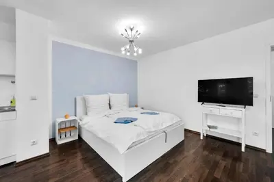 Ein Bett oder Betten in einem Zimmer der Unterkunft Wohnung im Herzen Münchens nähe Hauptbahnhof
