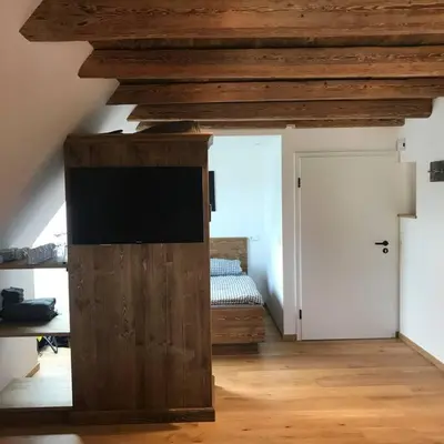 Ein Bett oder Betten in einem Zimmer der Unterkunft Ferienwohnung im Berghüttenstyle