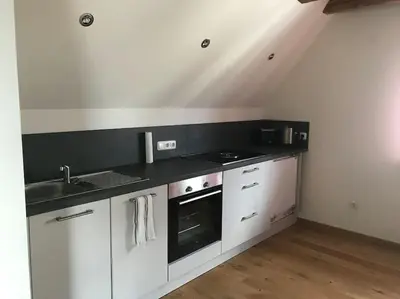 Küche/Küchenzeile in der Unterkunft Ferienwohnung im Berghüttenstyle
