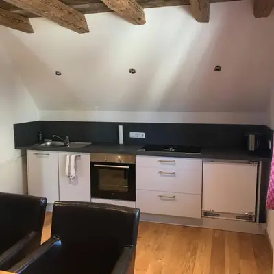 Küche/Küchenzeile in der Unterkunft Ferienwohnung im Berghüttenstyle