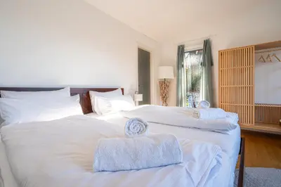 Ein Bett oder Betten in einem Zimmer der Unterkunft LIBORIA I Stylisches Haus I Sauna I Wellness