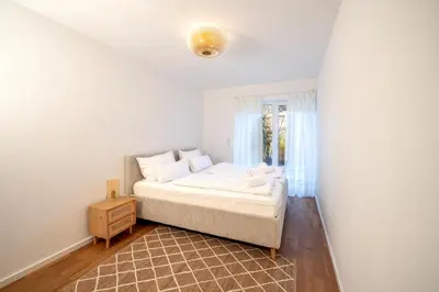 Ein Bett oder Betten in einem Zimmer der Unterkunft LIBORIA I Stylisches Haus I Sauna I Wellness