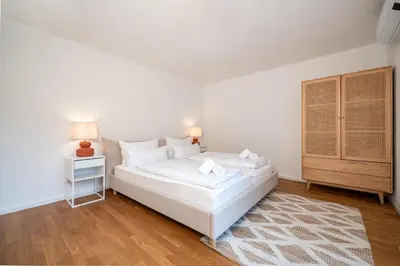 Ein Bett oder Betten in einem Zimmer der Unterkunft LIBORIA I Stylisches Haus I Sauna I Wellness